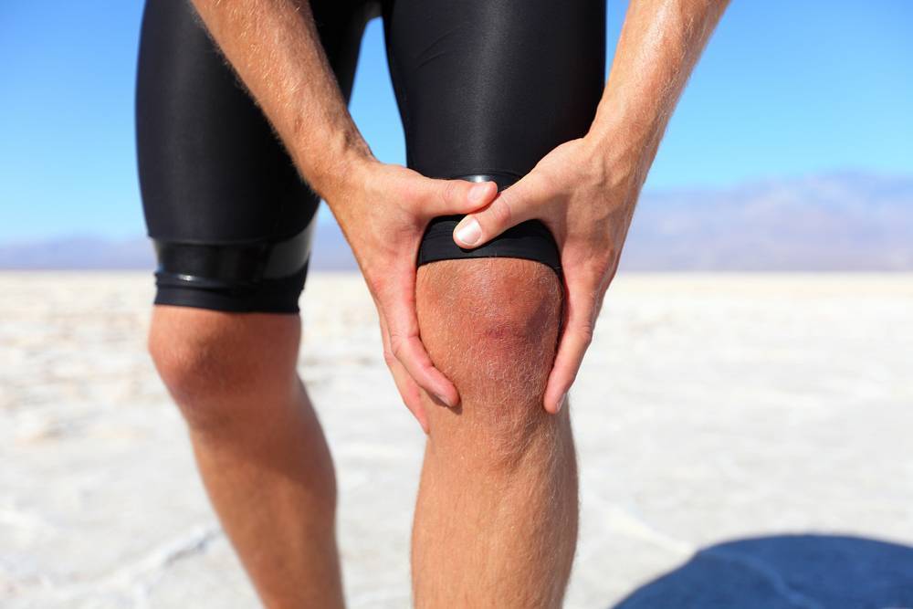 Болят колени после и во время бега: почему и что делать?