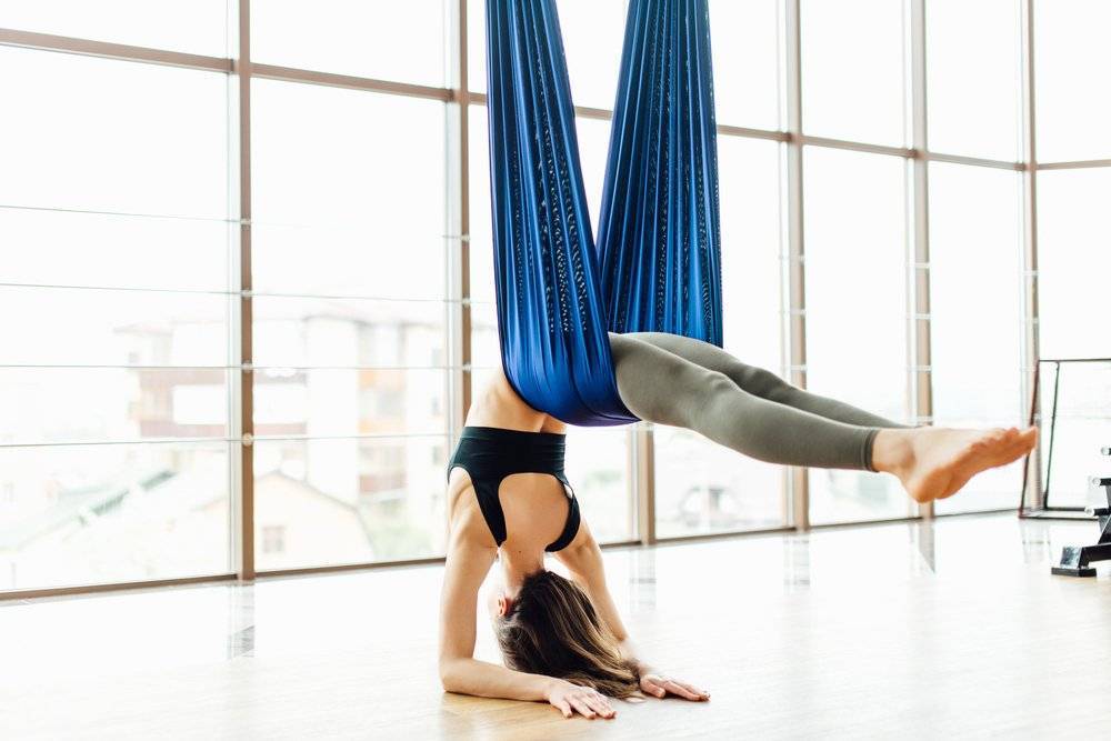 Воздушная йога в гамаках –польза и вред, упражнения
